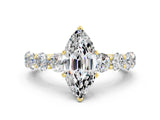 Yellow gold Marquise Cut Moissanite Prong Setting with Side Stones on a Pave Band