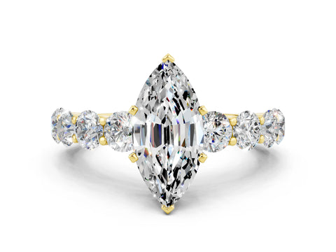 Yellow gold Marquise Cut Moissanite Prong Setting with Side Stones on a Pave Band