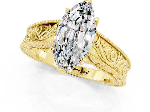 Yellow gold Marquise Cut Moissanite Solitaire Ring with Engraved Band and Four-Prong Setting_1
