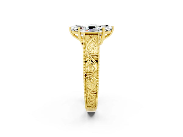 Yellow gold Marquise Cut Moissanite Solitaire Ring with Engraved Band and Four-Prong Setting