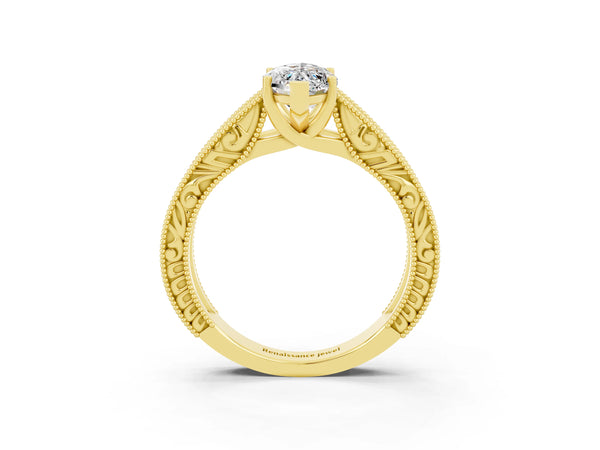 Yellow gold Marquise Cut Moissanite Solitaire Ring with Engraved Band and Four-Prong Setting