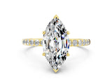 Yellow gold Marquise Cut Moissanite Solitaire Ring with Pave Band and Four Prong Setting