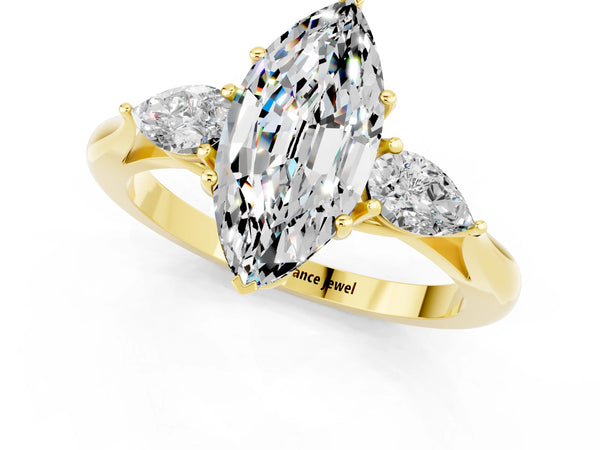 Yellow gold Marquise Cut Moissanite Three-Stone Ring with Pear  Side Stones and Prong Setting