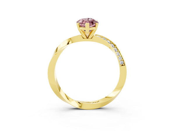 Yellow gold Marquise Cut Morganite Engagement Ring with Side Stone Accents and Four-Prong Setting