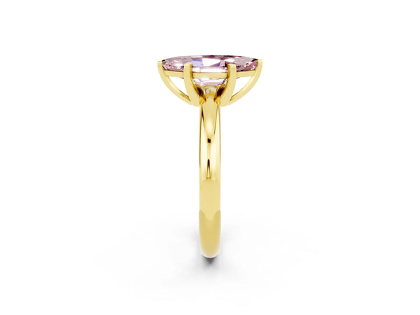 Yellow gold Marquise Cut Morganite Solitaire Engagement Ring with Round Band and Four-Prong Setting