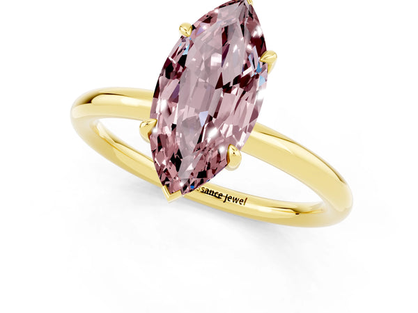 Yellow gold Marquise Cut Morganite Solitaire Ring with Thin Band and Four-Prong Setting