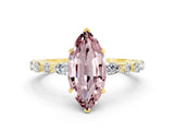 Yellow gold Marquise Cut Morganite Solitaire with Side Stones on a Pavé Band and Four-Prong Setting