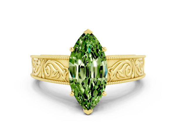 Yellow gold Marquise Cut Peridot Solitaire Ring with Engraved Band and Four-Prong Setting