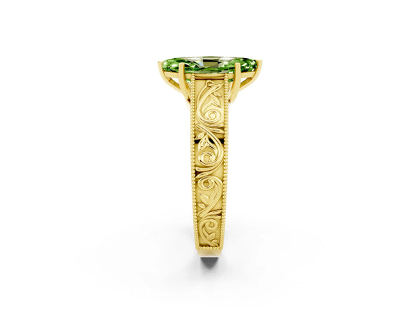 Yellow gold Marquise Cut Peridot Solitaire Ring with Engraved Band and Four-Prong Setting