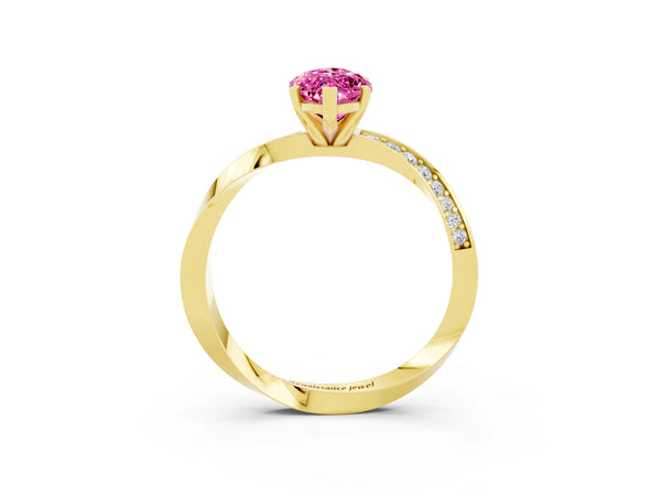 Yellow gold Marquise Cut Pink Sapphire Engagement Ring with Side Stone Accents and Four-Prong Setting