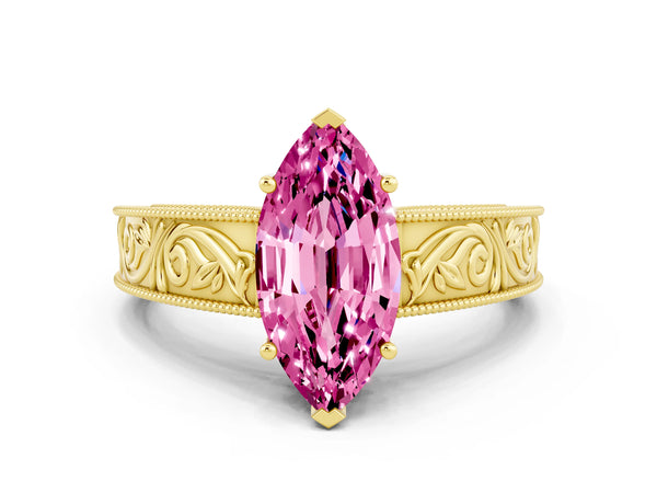 Yellow gold Marquise Cut Pink Sapphire Solitaire Ring with Engraved Band and Four-Prong Setting