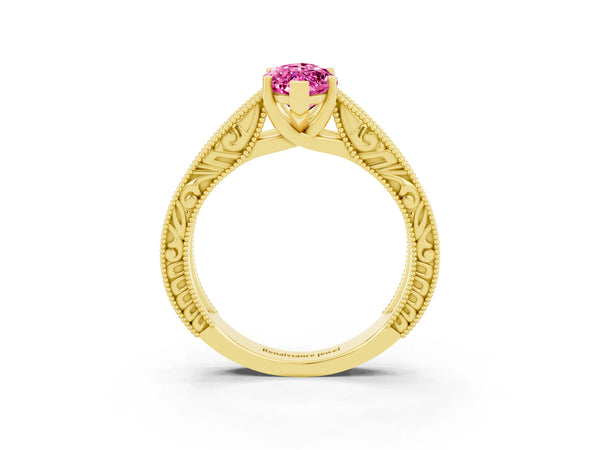 Yellow gold Marquise Cut Pink Sapphire Solitaire Ring with Engraved Band and Four-Prong Setting