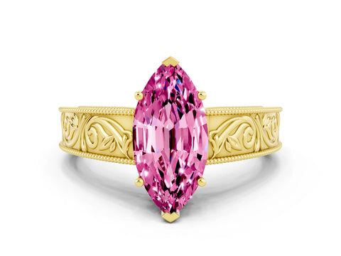 Yellow gold Marquise Cut Pink Sapphire Solitaire Ring with Engraved Band and Four-Prong Setting