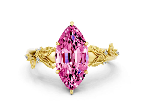 Yellow gold Marquise Cut Pink Sapphire Solitaire Ring with Leaf Motif Band and Four-Prong Setting