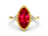 Yellow gold Marquise Cut Ruby Halo Ring with Tapered Band and Four-Prong Setting