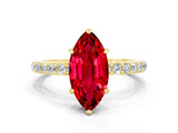Yellow gold Marquise Cut Ruby Solitaire Engagement Ring with Pavé Band and Four-Prong Setting