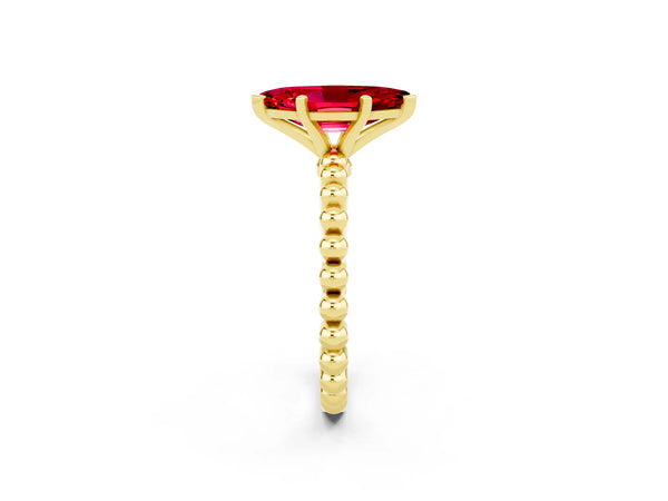 Yellow gold Marquise Cut Ruby Solitaire Ring with Beaded Band and Prong Setting