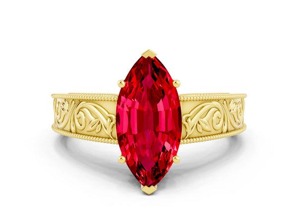 Yellow gold Marquise Cut Ruby Solitaire Ring with Engraved Band and Four-Prong Setting