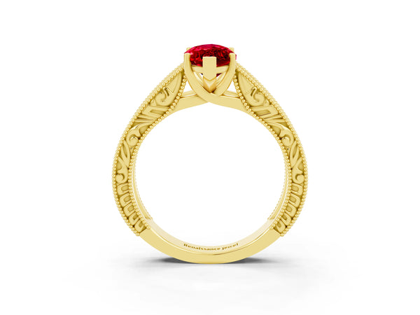 Yellow gold Marquise Cut Ruby Solitaire Ring with Engraved Band and Four-Prong Setting