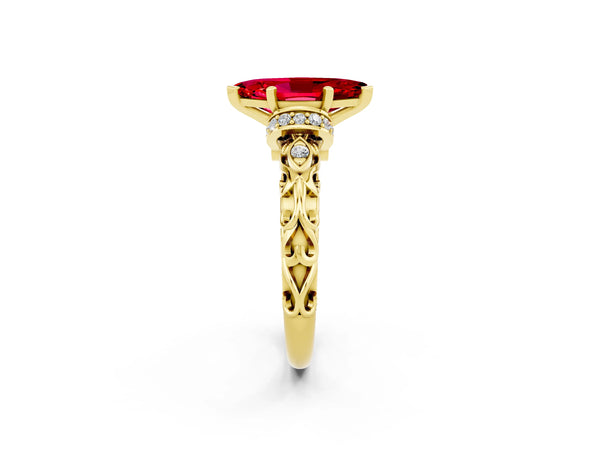 Yellow gold Marquise Cut Ruby Solitaire Ring with Filigree Band and Four-Prong Setting