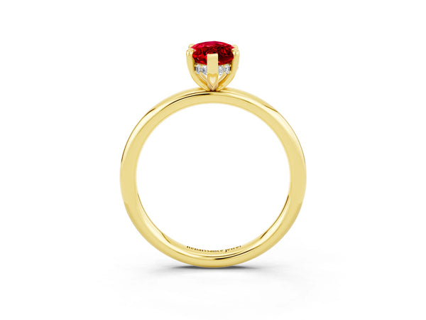 Yellow gold Marquise Cut Ruby Solitaire Ring with Thin Band and Four-Prong Setting
