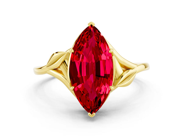 Yellow gold Marquise Cut Ruby Solitaire Ring with Twist Band and Four-Prong Setting
