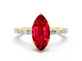 Yellow gold Marquise Cut Ruby Solitaire with Side Stones on a Pavé Band and Four-Prong Setting