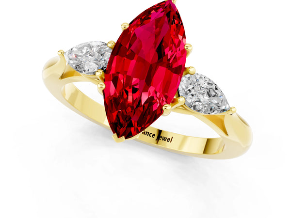 Yellow gold Marquise Cut Ruby Three-Stone Ring with Pear  Side Stones and Prong Setting