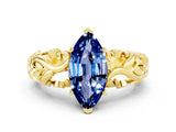 Yellow gold Marquise Cut Solitaire Blue Sapphire Leaf-Inspired Vine Band Ring with Prong Setting