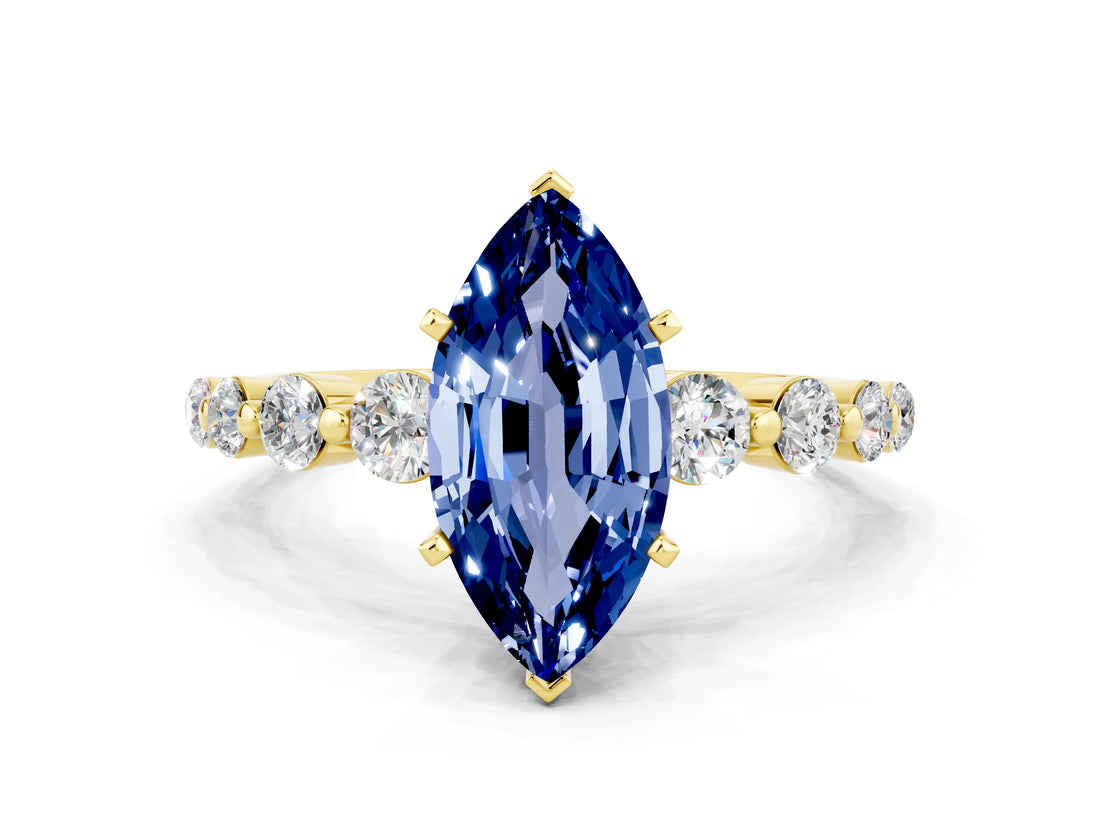 Yellow gold Marquise Cut Solitaire Blue Sapphire Ring with Pave Band and Four-Prong Setting