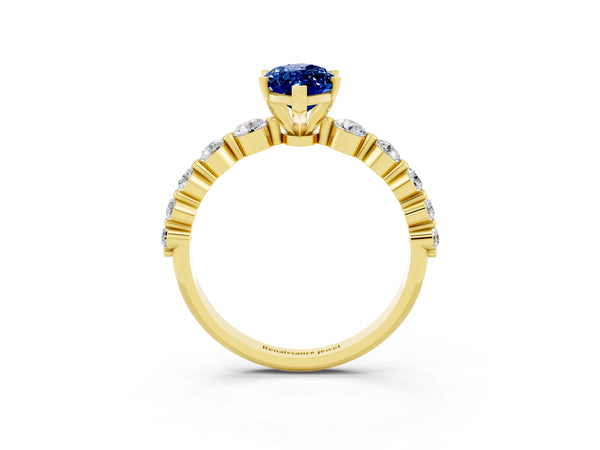 Yellow gold Marquise Cut Solitaire Blue Sapphire Ring with Pave Band and Four-Prong Setting