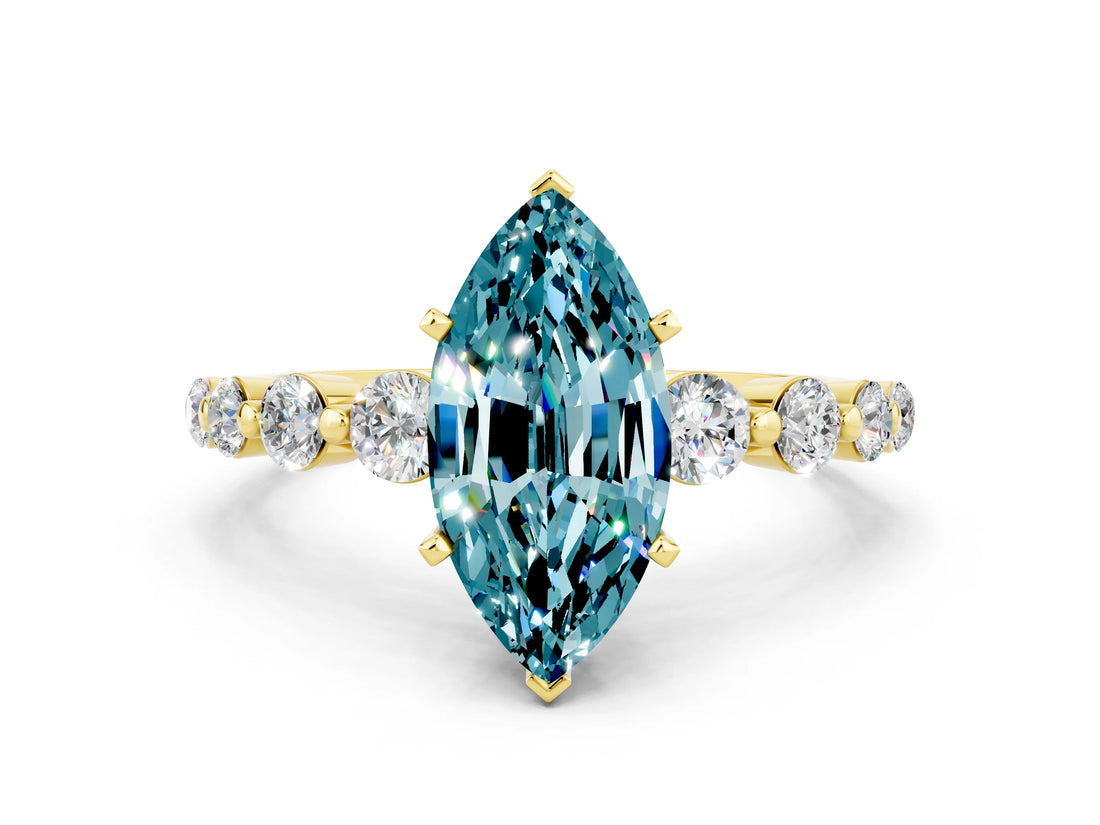 Yellow gold Marquise Cut Solitaire Blue Topaz Ring with Pave Band and Four-Prong Setting