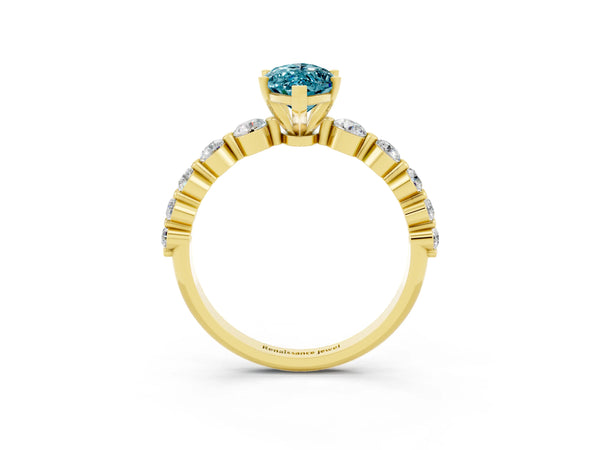 Yellow gold Marquise Cut Solitaire Blue Topaz Ring with Pave Band and Four-Prong Setting