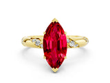 Yellow gold Marquise Cut Solitaire Diamond Engagement Ring with Twisted Pave Band and Four-Prong Setting