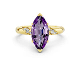 Yellow gold Marquise Cut Solitaire Diamond Engagement Ring with Twisted Pave Band and Four-Prong Setting