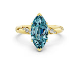 Yellow gold Marquise Cut Solitaire Diamond Engagement Ring with Twisted Pave Band and Four-Prong Setting