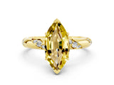 Yellow gold Marquise Cut Solitaire Diamond Engagement Ring with Twisted Pave Band and Four-Prong Setting