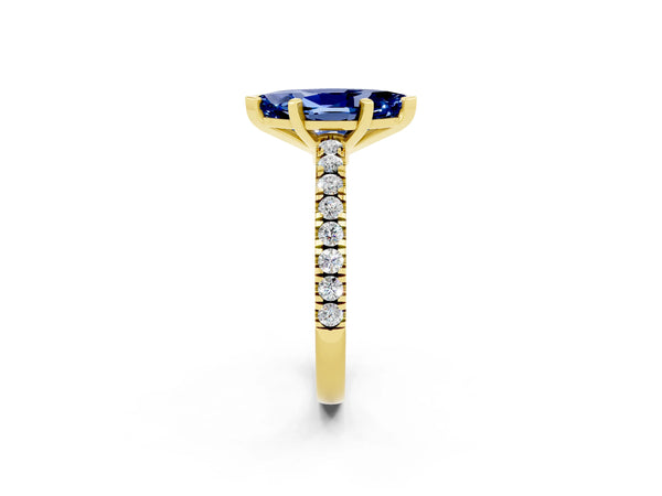 Yellow gold Marquise Cut Solitaire Blue Sapphire with Pavé Band and Four-Prong Setting