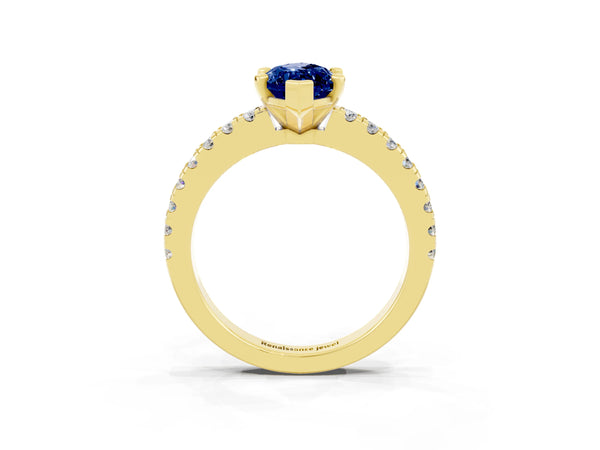 Yellow gold Marquise Cut Solitaire Blue Sapphire with Pavé Band and Four-Prong Setting