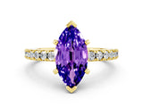 Yellow gold Marquise Cut Solitaire Diamond with Pavé Band and Four-Prong Setting