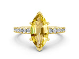 Yellow gold Marquise Cut Solitaire Diamond with Pavé Band and Four-Prong Setting