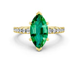 Yellow gold Marquise Cut Solitaire Diamond with Pavé Band and Four-Prong Setting