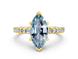 Yellow gold Marquise Cut Solitaire Diamond with Pavé Band and Four-Prong Setting