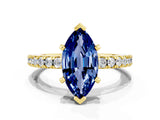 Yellow gold Marquise Cut Solitaire Diamond with Pavé Band and Four-Prong Setting