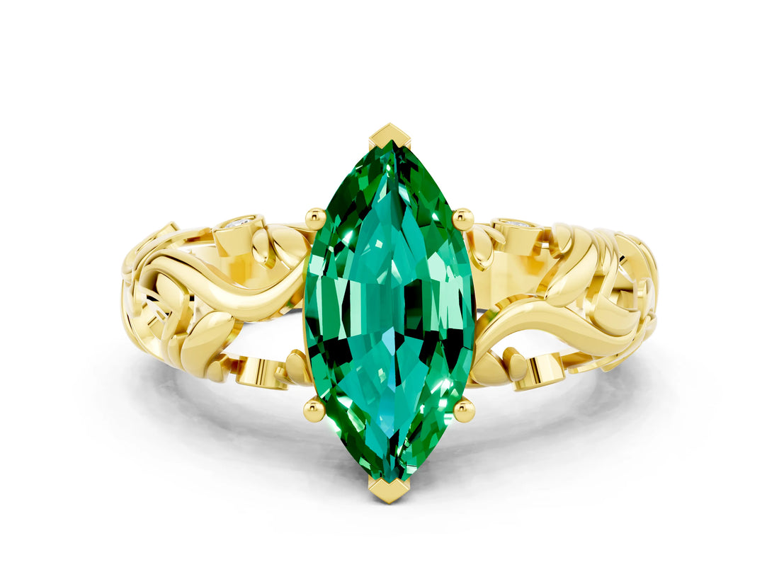 Yellow gold Marquise Cut Solitaire Emerald Leaf-Inspired Vine Band Ring with Prong Setting