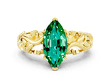 Yellow gold Marquise Cut Solitaire Emerald Leaf-Inspired Vine Band Ring with Prong Setting