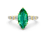 Yellow gold Marquise Cut Solitaire Emerald Ring with Pave Band and Four-Prong Setting