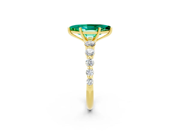 Yellow gold Marquise Cut Solitaire Emerald Ring with Pave Band and Four-Prong Setting