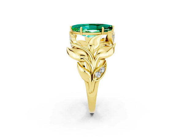 Yellow gold Marquise Cut Emerald Leaf-Inspired Engagement Ring with Round Accents and Prong Setting