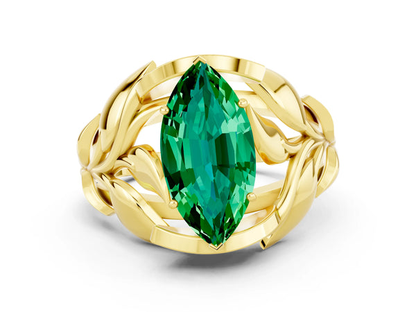 Yellow gold Marquise Cut Emerald Leaf-Inspired Engagement Ring with Round Accents and Prong Setting
